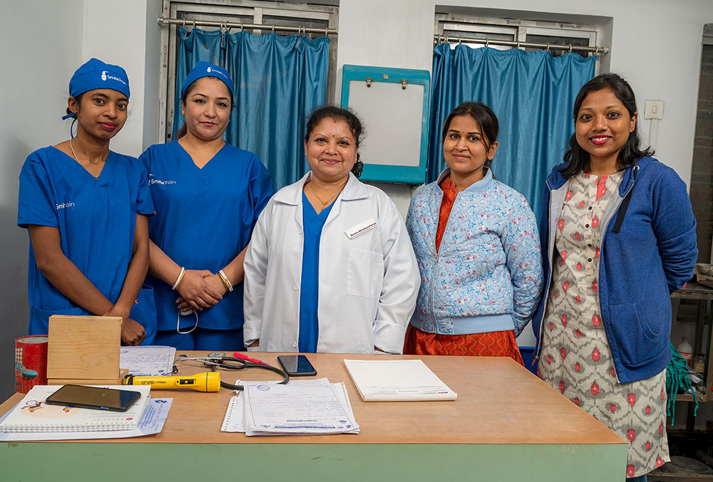 Dr Neela with some of the women on her staff