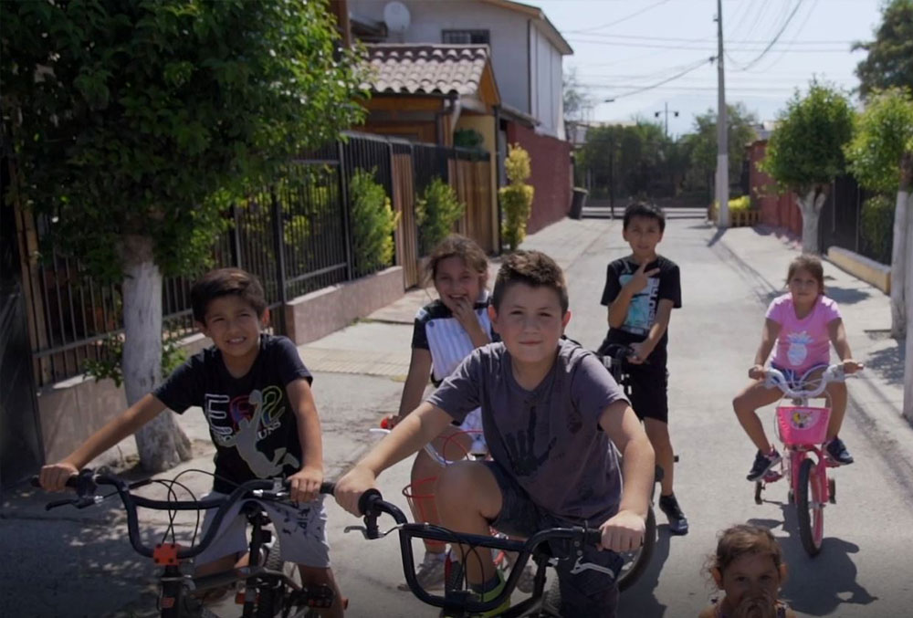 Amaro riding bikes with his friends